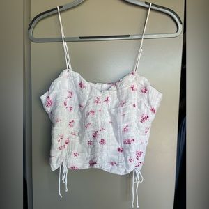 Pink and white floral cropped tank